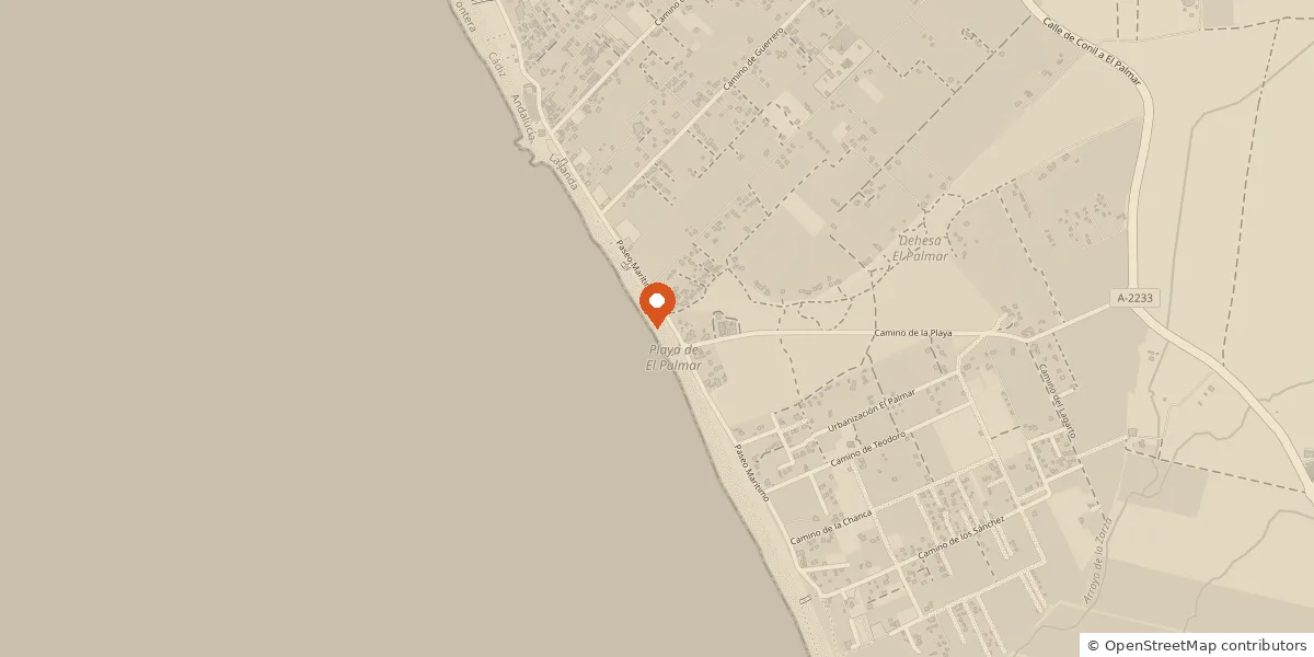 Mapa de la playa de El Palmar, en Vejer de la Frontera, con la escuela marcada junto al paseo, frente a la playa.